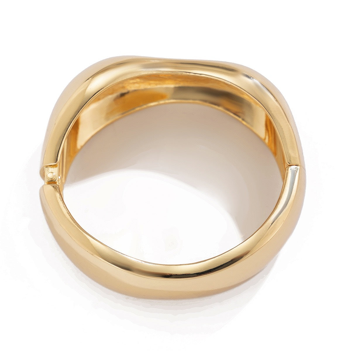 Bracciale rigido a molla in metallo placcato lucido a goccia geometrica di moda da donna