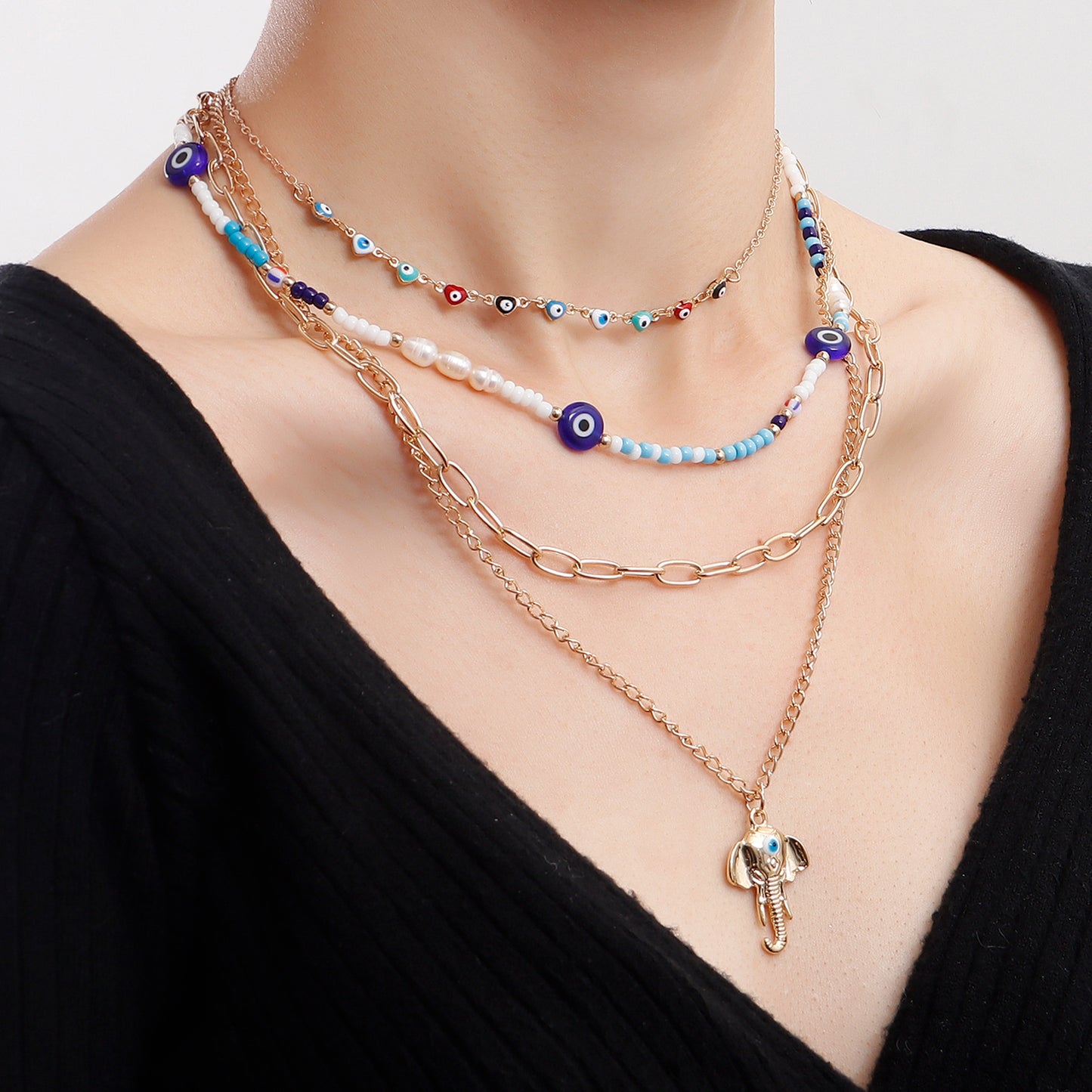 Bohemian Multi-Layer Heart-Shaped Evil Eye Beaded Necklace for Women with Alloy Pendant and Plated Finish