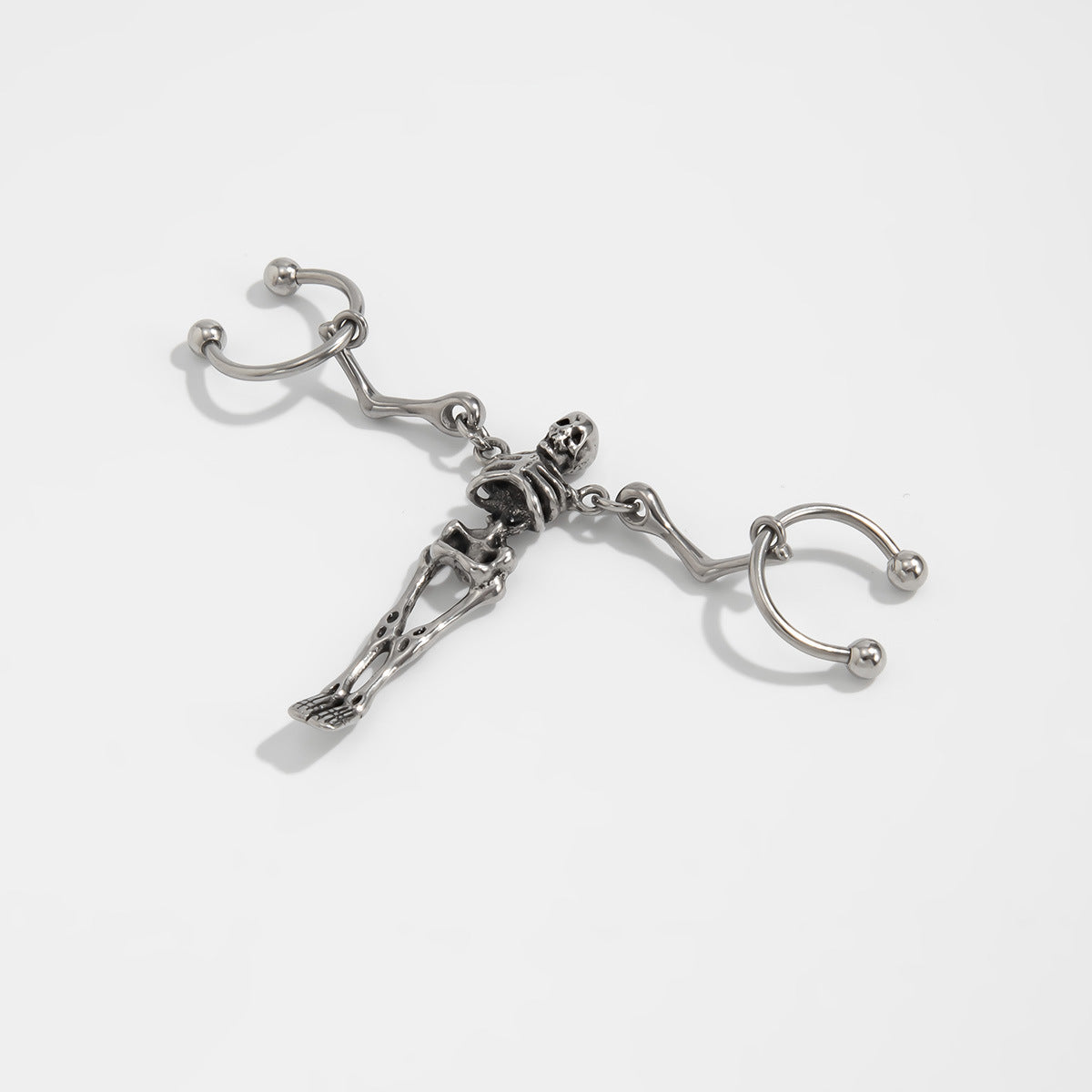Orecchini per cartilagine da donna a forma di teschio staccabile in stile scuro in acciaio al titanio con design geometrico e a cartone animato di scheletro umano