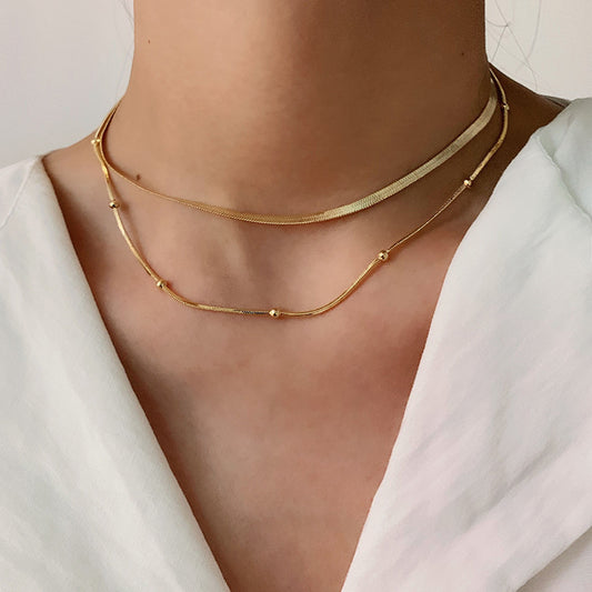 Collana Girocollo Minimalista Geometrica in Acciaio Inossidabile con Perline Placcate Oro 14K e Catena a Serpente da Donna