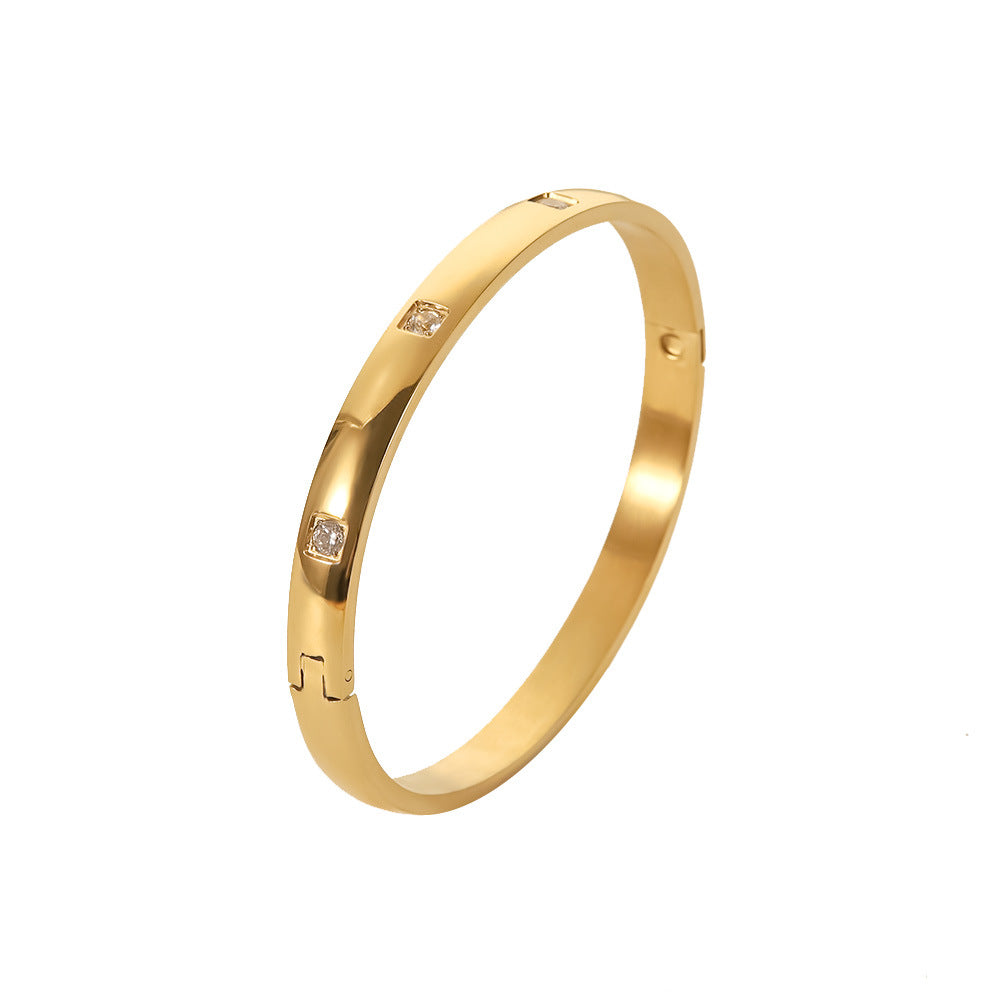 Bracciale Minimalista Geometrico da Donna in Acciaio al Titanio Placcato Oro 18K con Intarsio di Zirconi Bianchi Rotondi