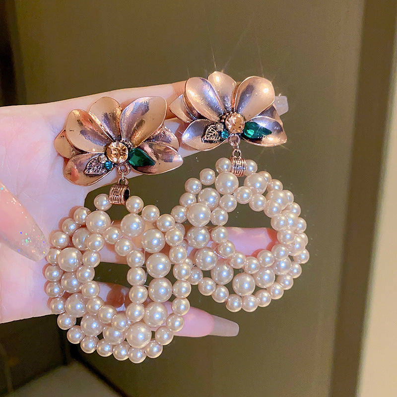 Orecchini a perno vintage in lega a forma di goccia con intarsio in strass e perni in acciaio inossidabile da donna
