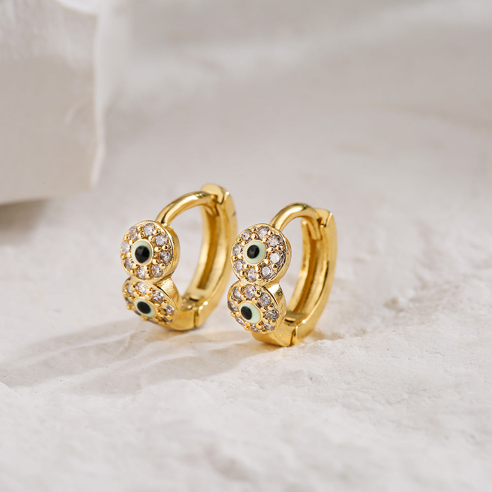 Orecchini Minimalisti Geometrici in Rame con Placcatura in Oro 18K e Dettaglio a Occhio Smaltato con Intarsio di Zirconi