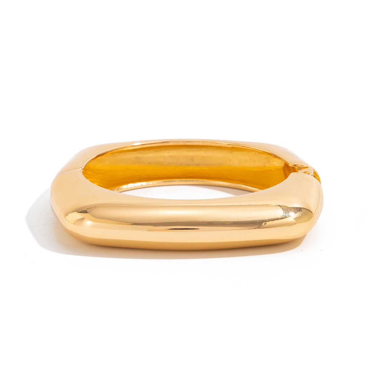 Bracciale rigido aperto a C geometrico oversize in lega con finitura placcata da donna