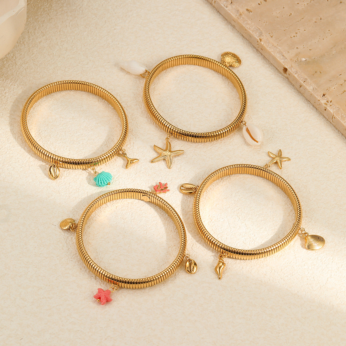 Elegante bracciale placcato in acciaio inossidabile a forma di stella, geometrico, con ciondolo a stella e conchiglia per donna
