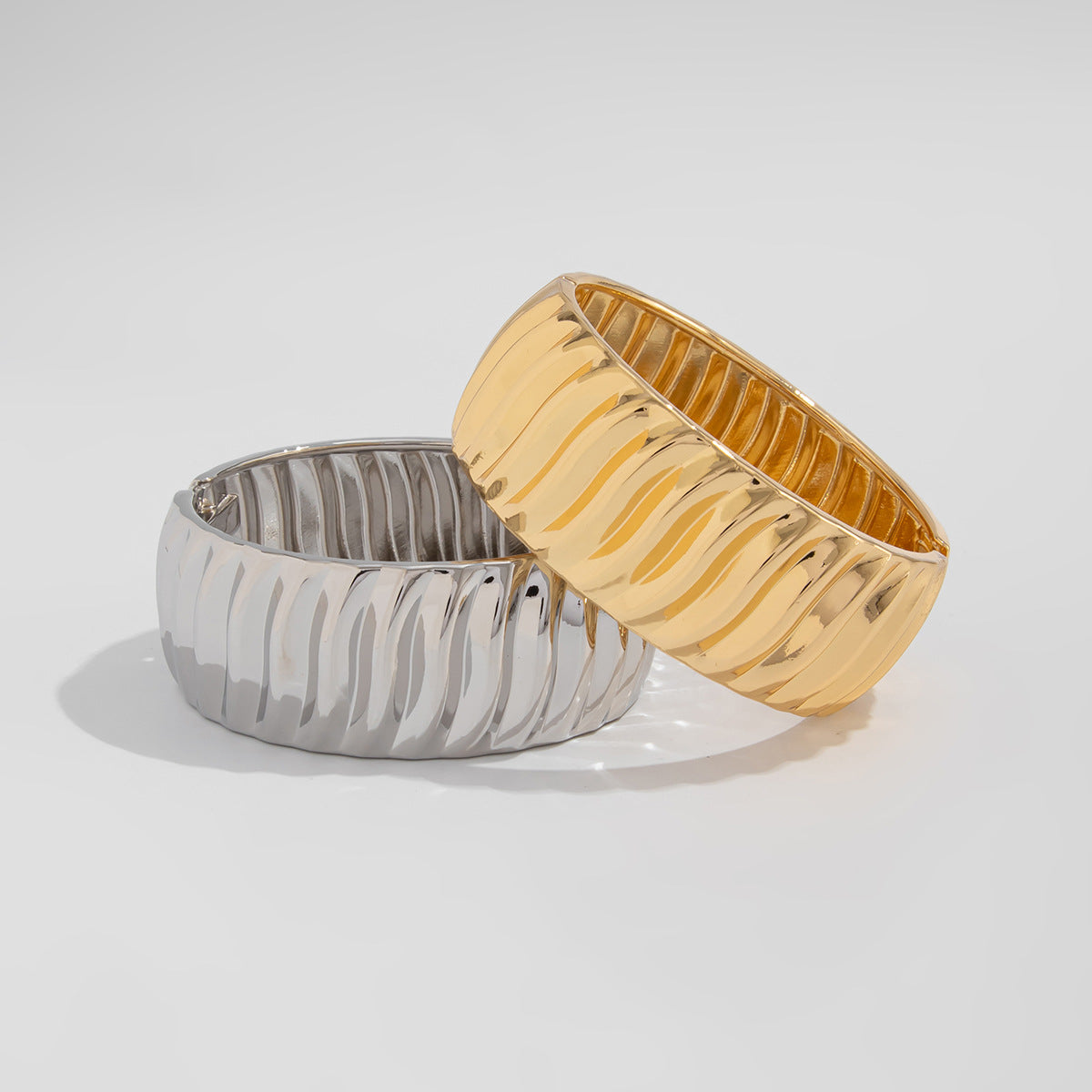 Twisted Water Wave Plated Zinc Alloy Spring Bangle Bracelet