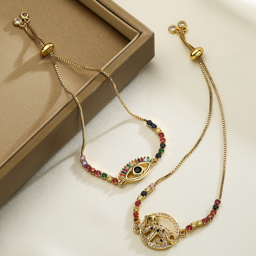 Minimalist Geometric Evil Eye Adjustable Bracelet for Women with Brass Base and Gold Plating Featuring Micro-Pave Leopard Charm
