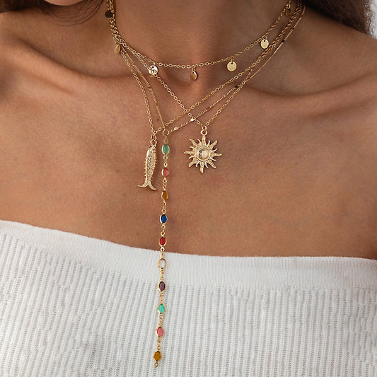 Minimalist Ocean-Inspired Fish Pendant Necklace with Crystal Accents and Layered Tassel Detail for Women