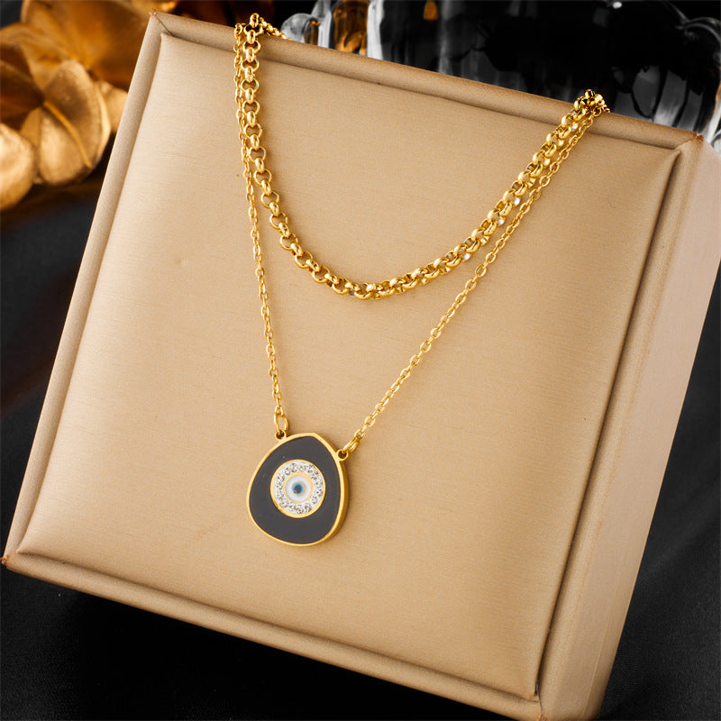 Collana da donna con ciondolo a farfalla e stella a strati in acciaio inossidabile alla moda