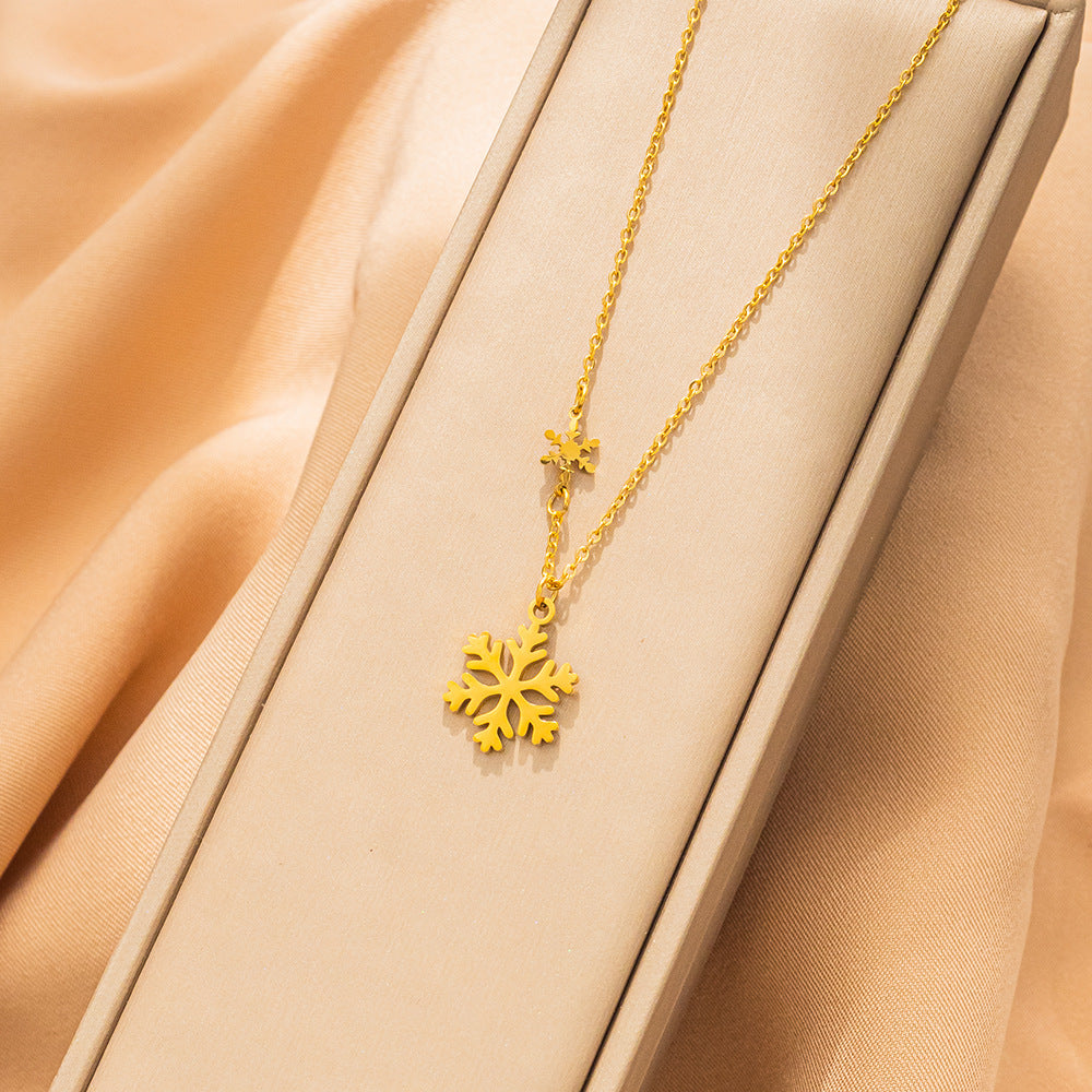Collana con ciondolo a fiocco di neve minimalista in acciaio al titanio placcato oro 18K da donna, catena con medaglione dal design geometrico