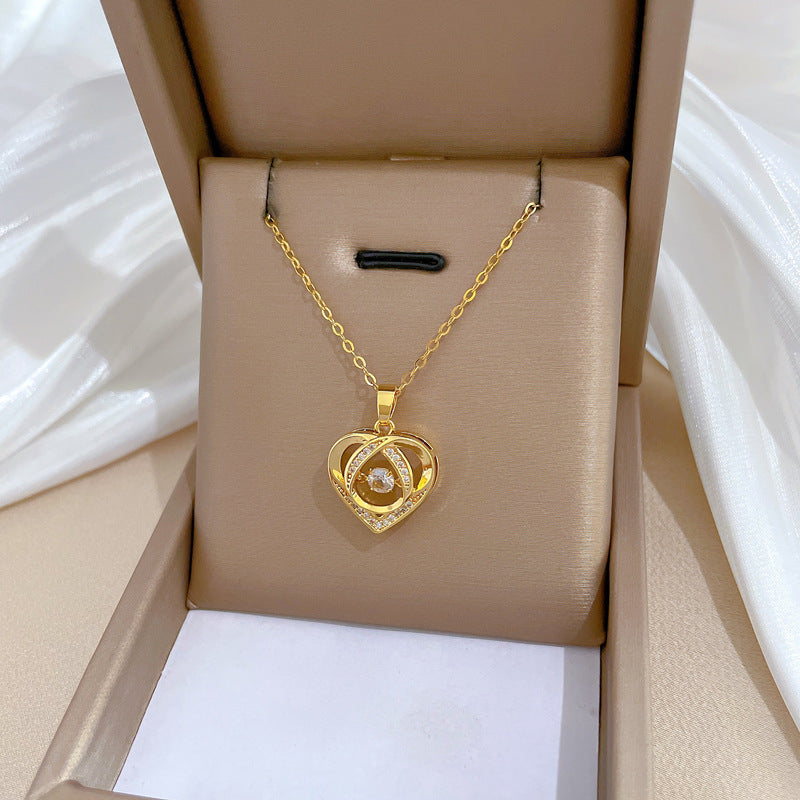 Collana di Lusso da Donna in Acciaio al Titanio con Ciondolo a Cuore di Zirconi e Delicata Catena a Clavicola, Design Geometrico