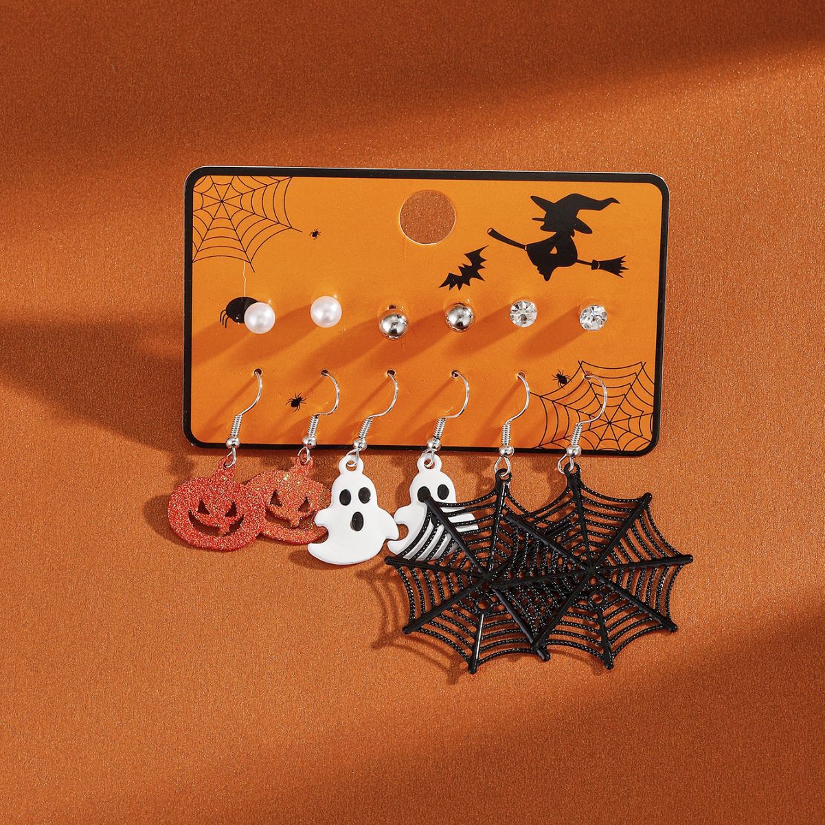 Juego de pendientes de Halloween estilo dibujos animados con diseño de calabaza, aretes de aleación y postes de acero inoxidable para mujer