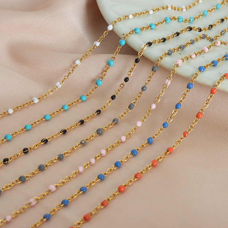 Conjunto minimalista de collar y pulsera de cadena con eslabones O de acero de titanio y detalles de esmalte para mujer