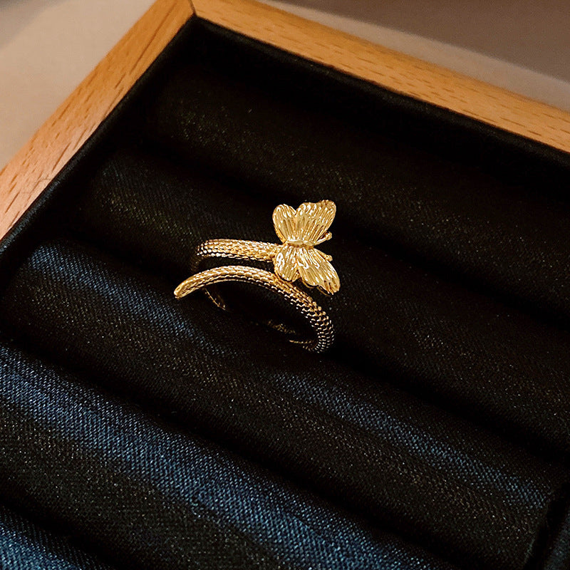 Anello da donna aperto a rombo a forma di fiore di iris in rame con intarsio di zirconi, ispirato al vintage