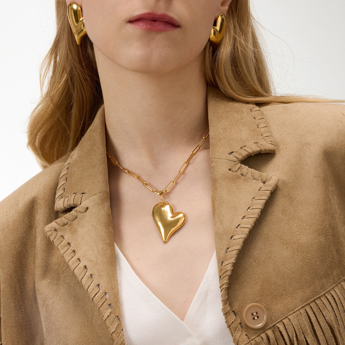 Collana con ciondolo a cuore geometrico in titanio e catena in acciaio inossidabile galvanizzato per donna