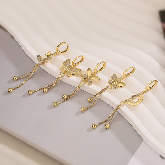 Orecchini a farfalla minimalisti in rame con placcatura in oro 18 carati e accento di zirconi, design elegante a goccia pendente per donna