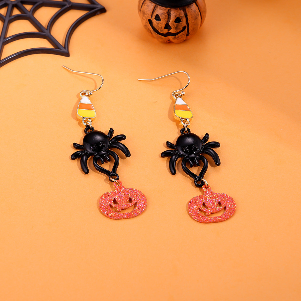 Juego de pendientes de Halloween estilo dibujos animados con diseño de calabaza, aretes de aleación y postes de acero inoxidable para mujer
