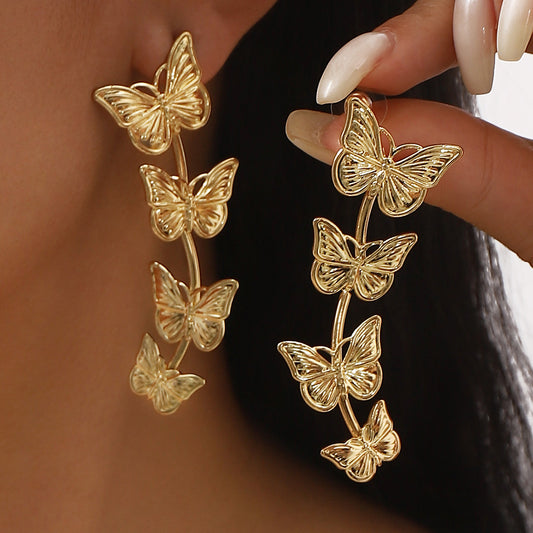 Pendientes minimalistas de mariposa en aleación con acabado chapado para mujer, diseño irregular de inspiración vintage