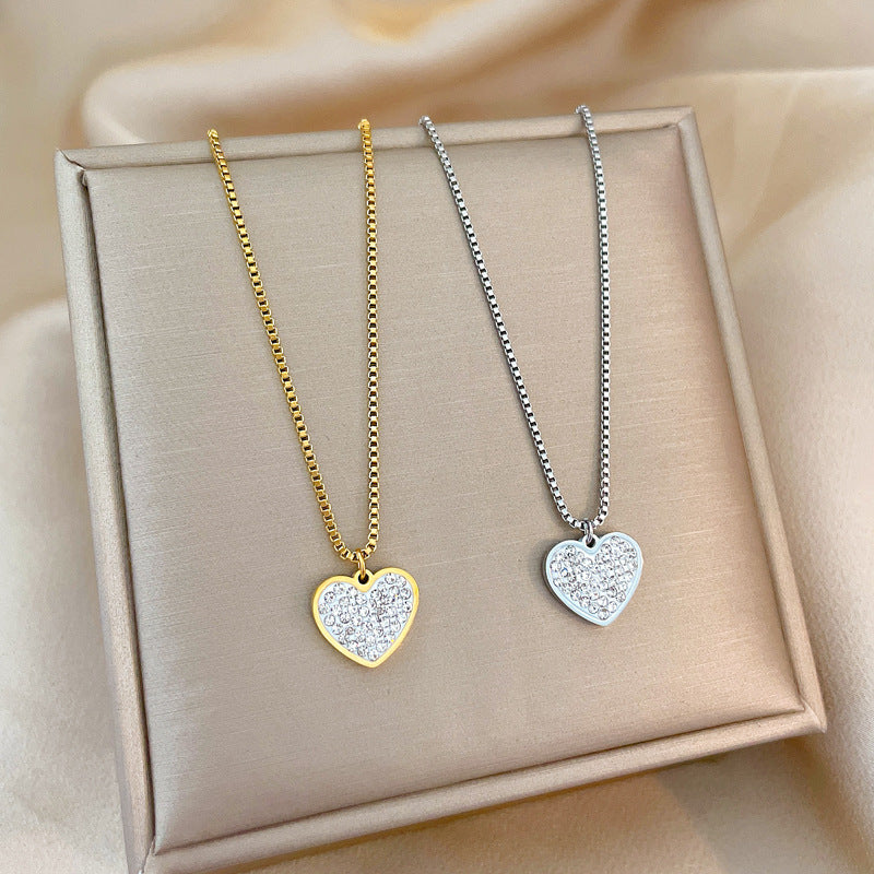 Collar con colgante de corazón de acero de titanio de lujo minimalista para mujer con baño de oro y diseño geométrico
