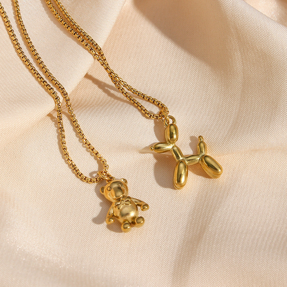 Collar con colgante minimalista de perro globo en acero inoxidable con baño de oro de 18 quilates para mujer