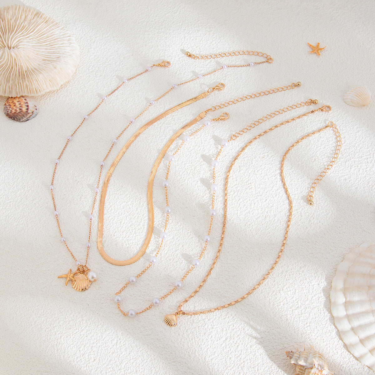 Minimalist Ocean-Inspired Star and Shell Pendant Necklace for Women with Imitation Pearl and Alloy, Plated Snake Chain