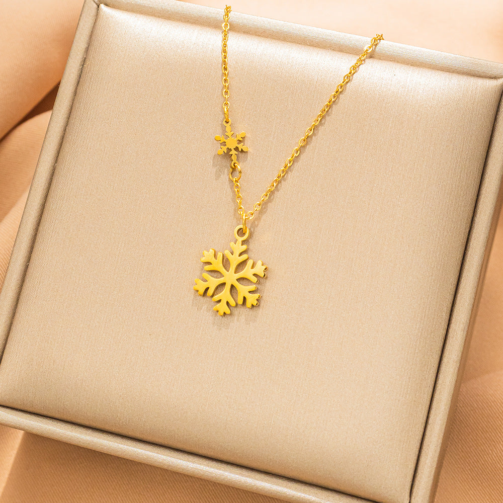 Collana con ciondolo a fiocco di neve minimalista in acciaio al titanio placcato oro 18K da donna, catena con medaglione dal design geometrico