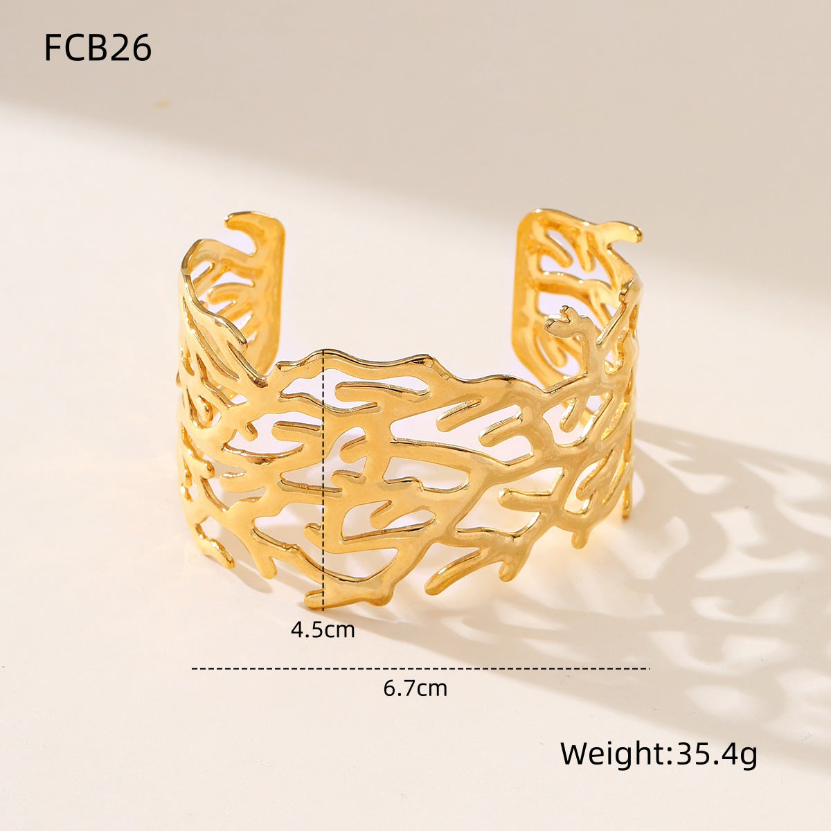 Pulsera de acero inoxidable con hoja hueca geométrica minimalista y acabado chapado para mujer