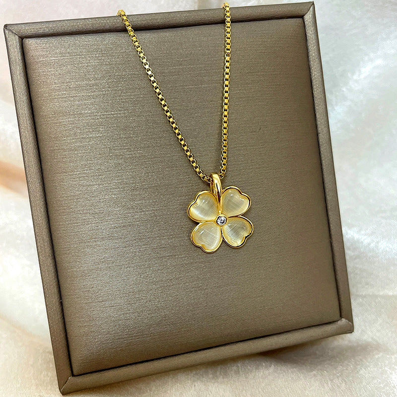 Collana con ciondolo a goccia in rame placcato oro 18 carati con micro-pavé e catena a onda in acciaio al titanio, design originale