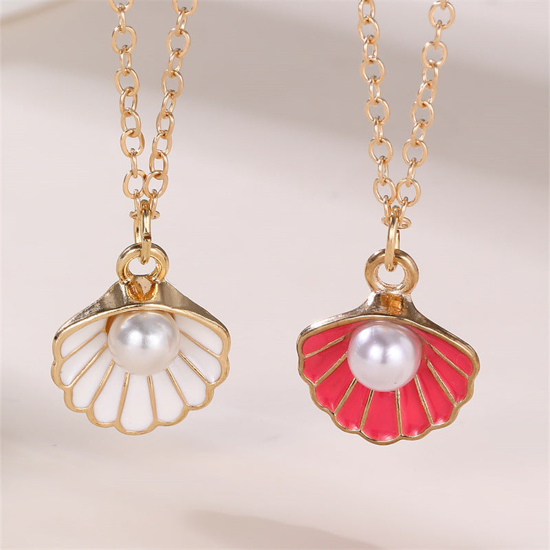 Dulce Collar con Colgante de Mariposa y Lazo Fresco para Niñas con Dije de Concha con Perlas de Aleación y Acabado Esmaltado Artesanal