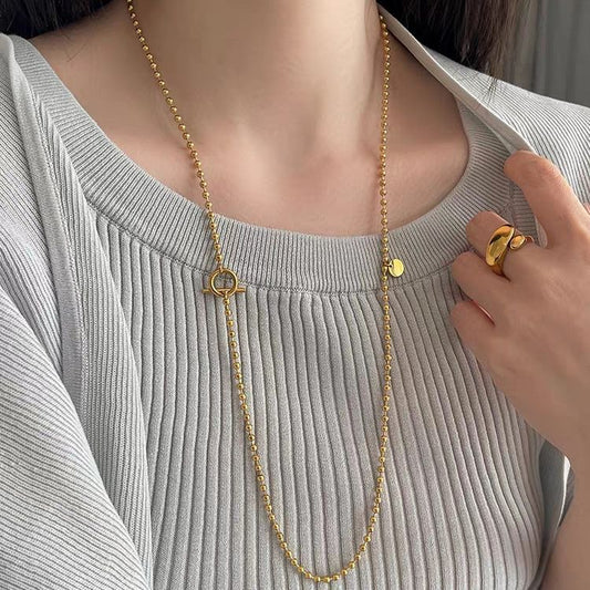 Collana da donna a forma di U in stile vintage francese in acciaio al titanio placcato oro 18 carati con catena lunga per maglione