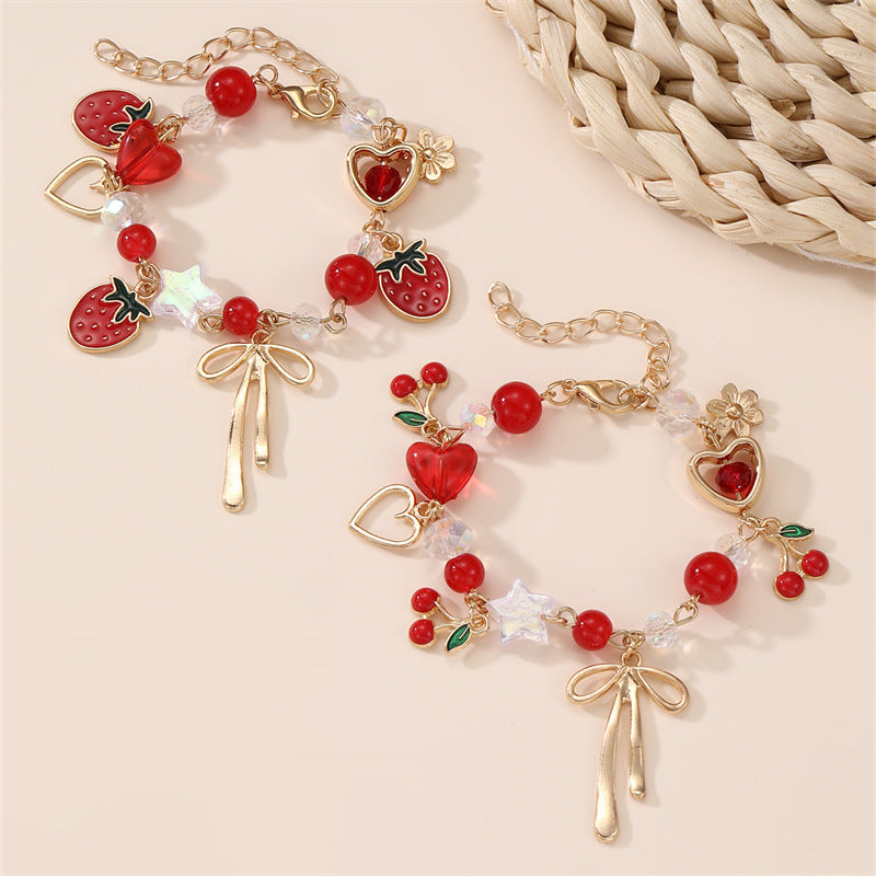 Pulsera con dije de lazo de corazón de cereza dulce para niñas, hecha de resina con detalles artesanales