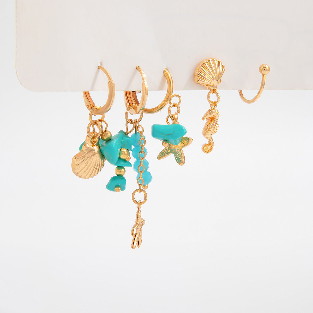 Pendientes geométricos con forma de estrella y borla, estilo retro vacaciones, con colgante turquesa, para mujer
