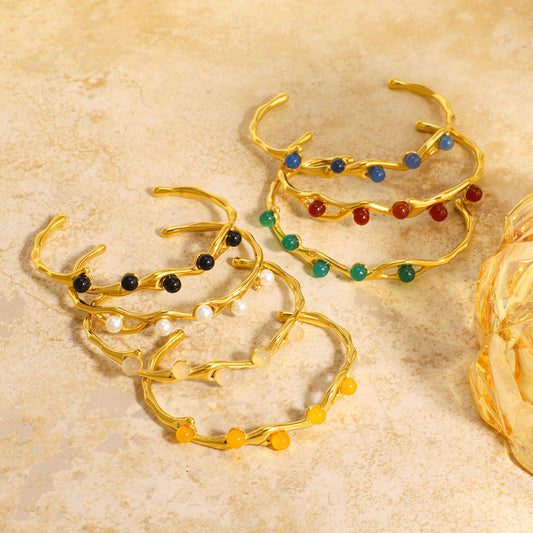 Bracciale aperto da donna in acciaio al titanio stile vintage con intarsio di pietra naturale e perle, design geometrico