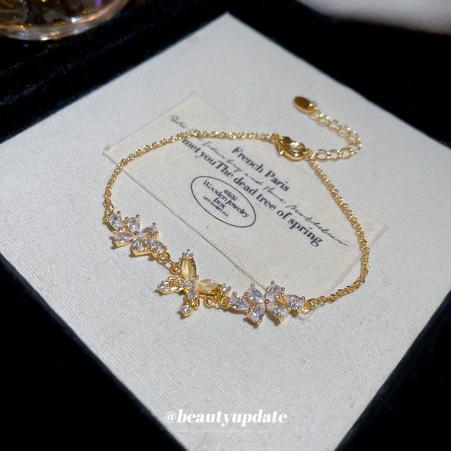 Bracciale da donna placcato oro 18 carati con zirconi a forma di farfalla in stile lusso