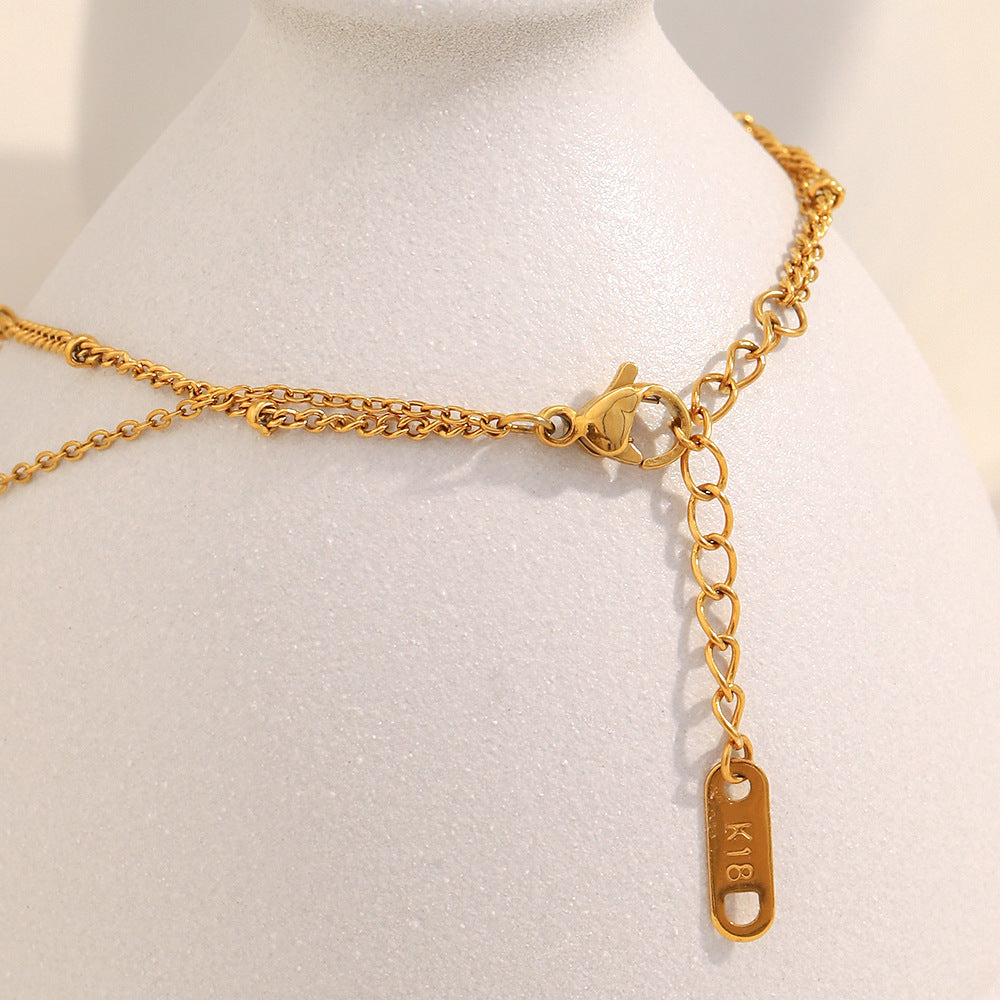 Elegant Ocean-Inspired Dolphin Pendant Necklace in Stainless Steel with 18K Gold Plating, Double-Layer Design with Pearl Accents