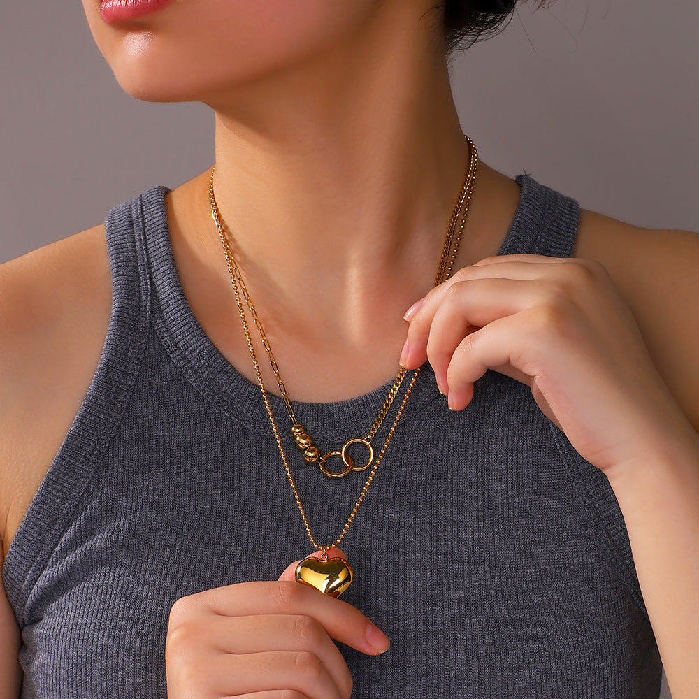 Collana con Pendente a Cuore Minimalista in Acciaio al Titanio con Placcatura in Oro 18K su Catena in Acciaio Inossidabile da Donna