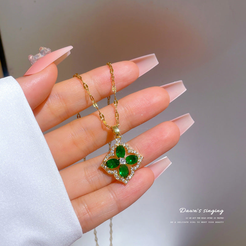 Luxury Titanium Steel Micro-Paved Zircon Four-Leaf Clover Necklace for Women with Gold-Plated Copper Pendant and Adjustable Chain
