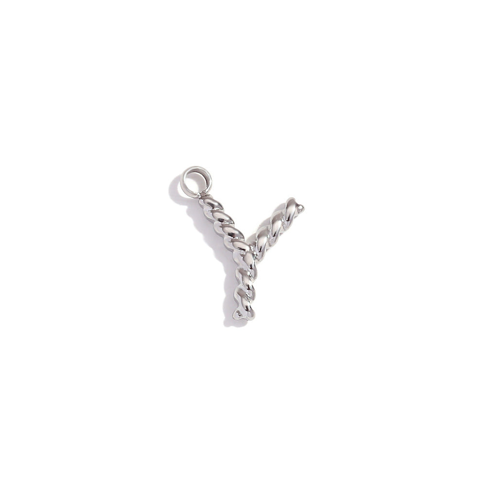 Colgante minimalista de acero inoxidable chapado en oro de 18 quilates con mini letra retorcida para mujer