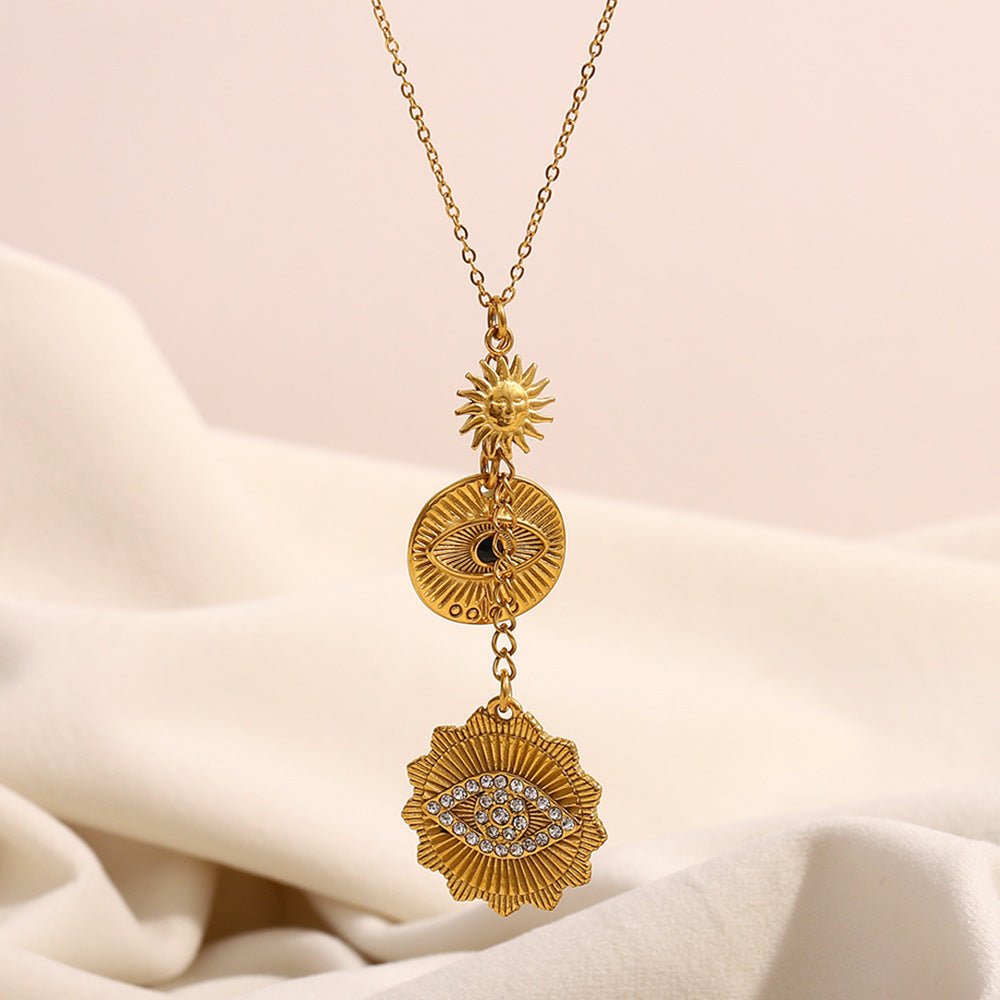 Collar con colgante geométrico minimalista de acero inoxidable con baño de oro de 18 quilates y detalle de borla de ojo para mujer