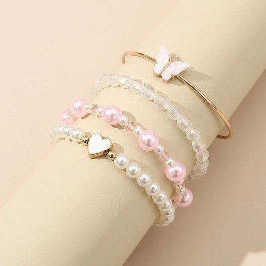 Juego de pulseras de aleación con forma de corazón y mariposa para niñas con detalles de perlas, pulsera de moda minimalista para niñas