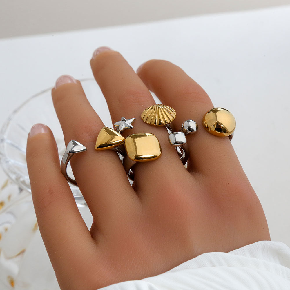 Conjunto de anillos abiertos minimalistas de acero de titanio con detalles de goteo y triángulo para mujer