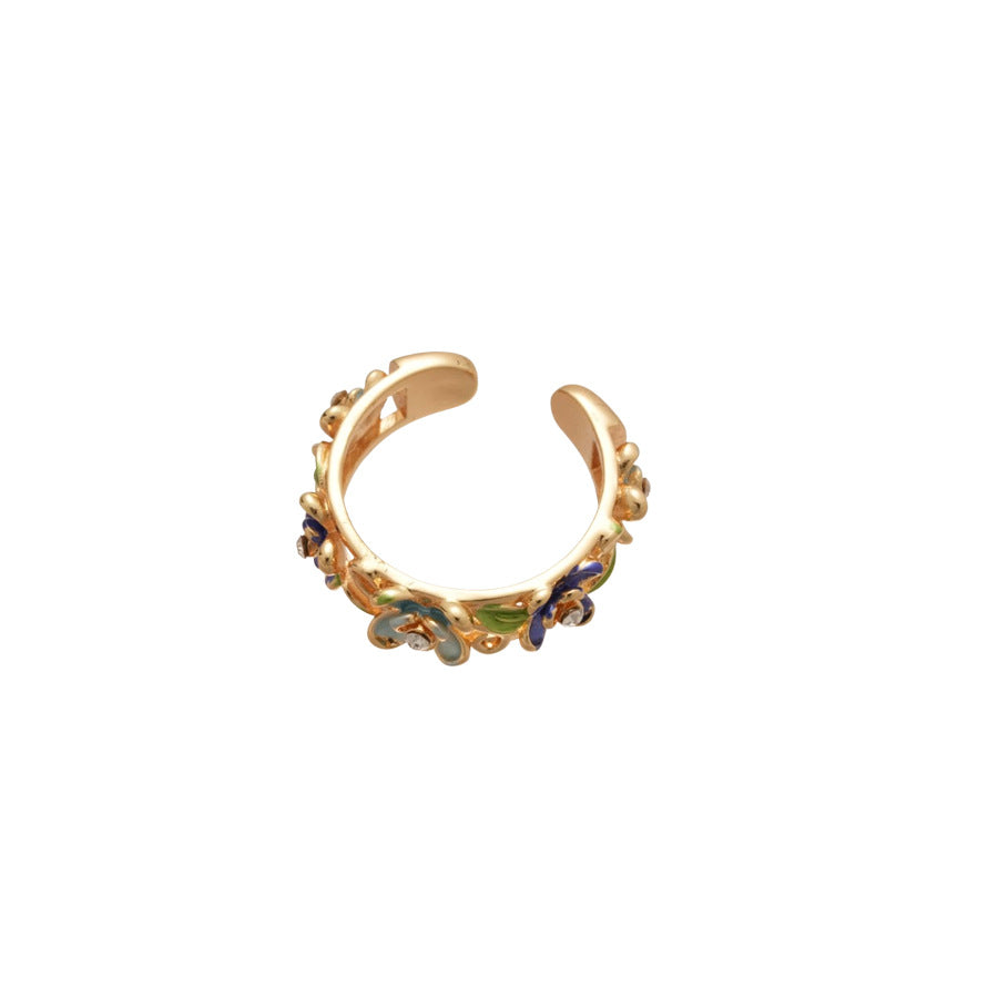 Anello floreale elegante con finitura smaltata e intarsio di strass da donna, fascia per l'indice di alta moda ispirata al vintage
