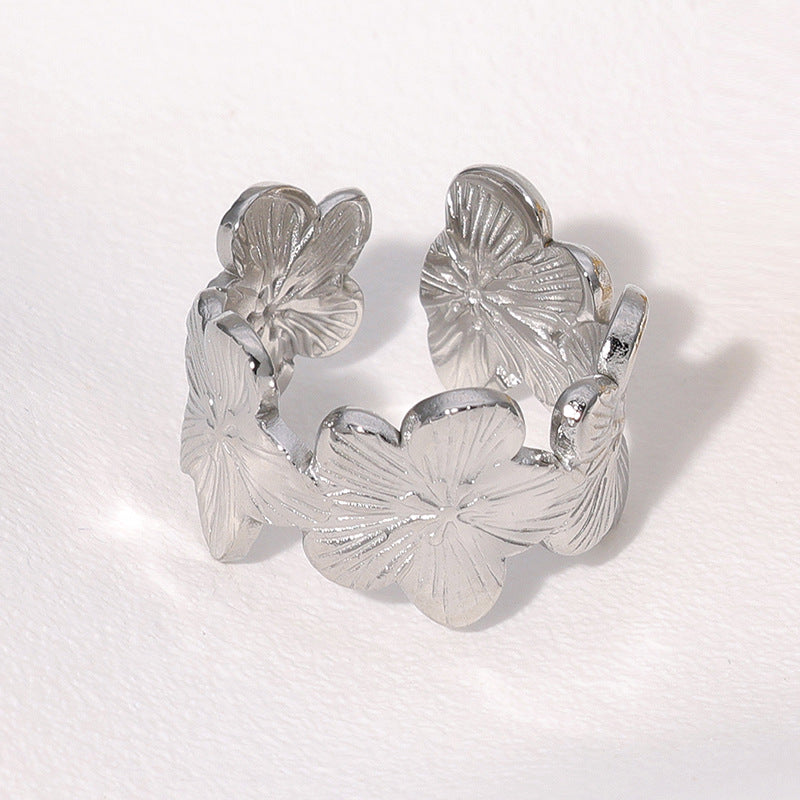 Anillo floral rústico para mujer de acero inoxidable con acabado chapado y banda ajustable