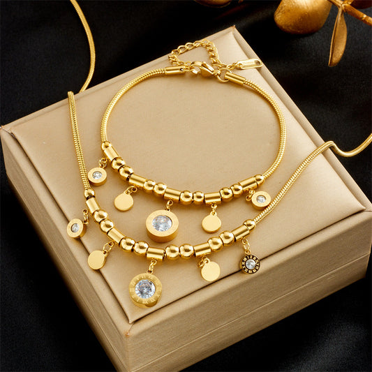 Set di collana con pendente rotondo e bracciale alla moda e minimalista da donna in acciaio al titanio con finitura placcata