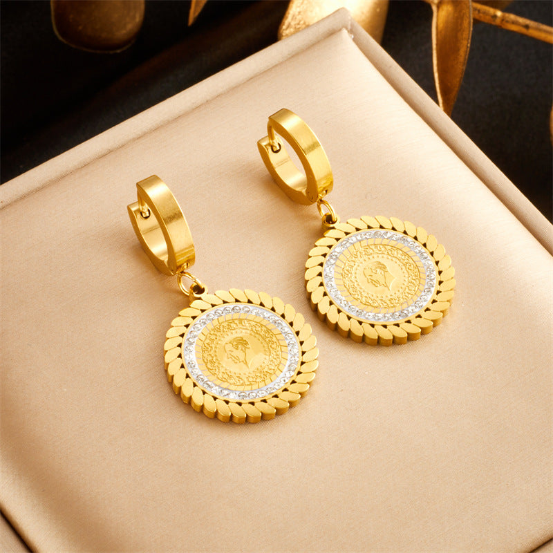 Collana pendente rotonda in metallo con strass e finitura placcata, dal design geometrico di ispirazione vintage da donna