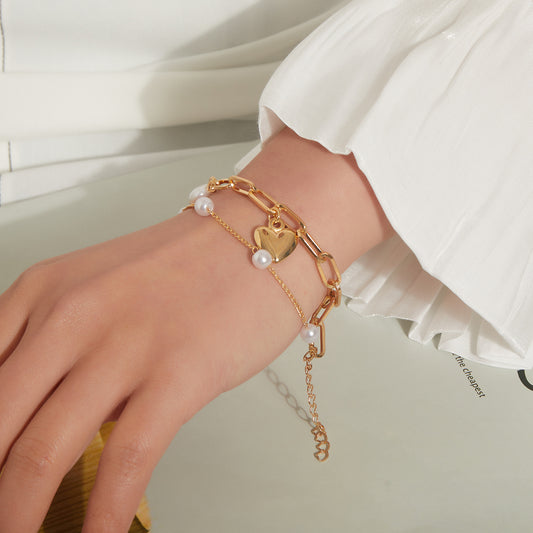 Punk Style Heart-Shaped Alloy Bracelet for Women with Electroplated Finish and Pearl Accent