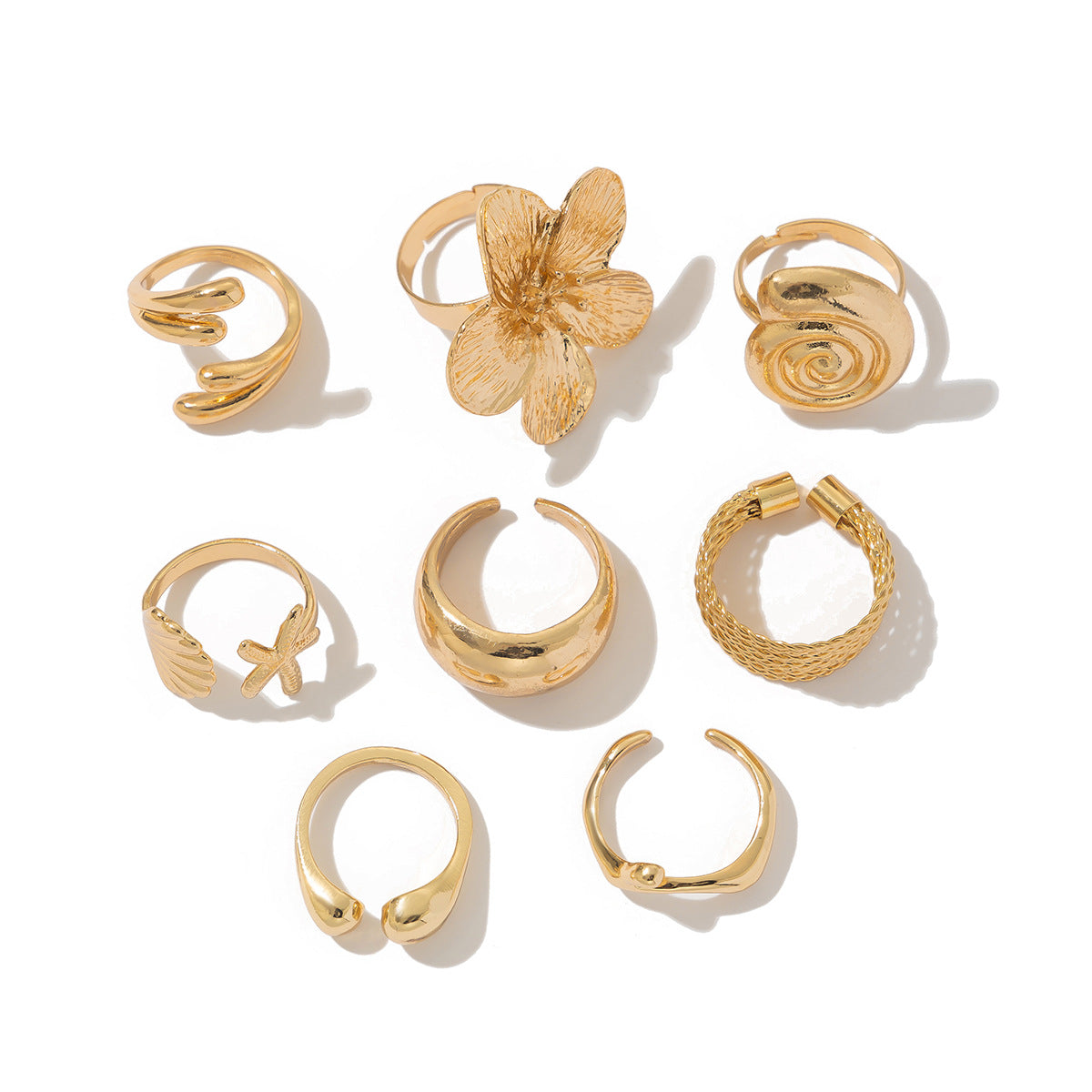 Anello aperto personalizzato con elementi floreali e geometrici, conchiglia e stella