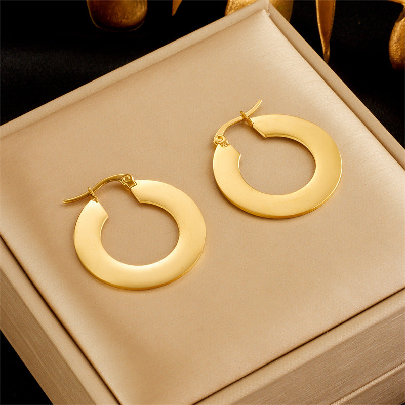 Minimalist Geometric Stainless Steel Hoop Earrings with Polished Finish and Cool-Tone Aesthetic
