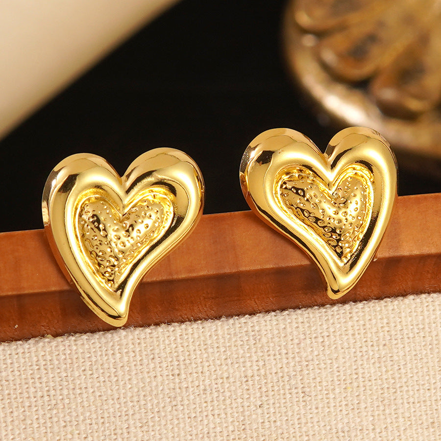 Orecchini vintage in acciaio inossidabile placcato a forma di cuore irregolare da donna