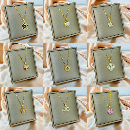 Rotatable Four-Leaf Clover Pendant Necklace in Titanium Steel with Micro-Paved Zirconia for Women